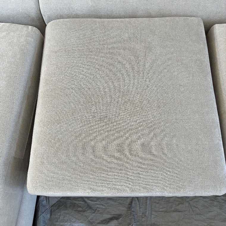 The same sectional seat cushion after professional upholstery cleaning